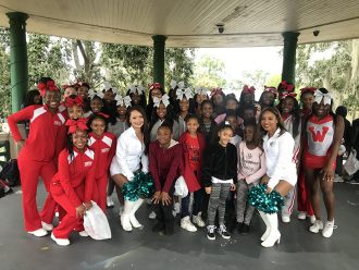 Cheerleaders from Westside High School, Pinedale Elementary, and the Jaguars ROAR
