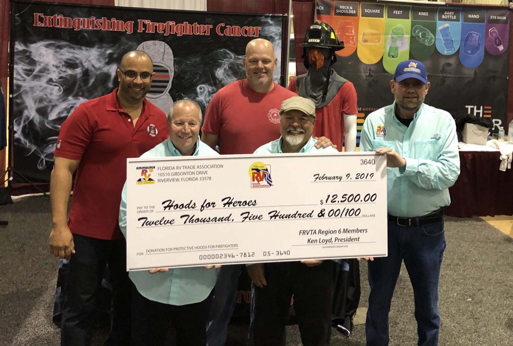 The Florida RV Trade Association presents Hoods for Heroes with a special check during its annual RV Mega Show on Feb. 9, at the Jacksonville Equestrian Center. FRVTA donated a portion of its revenues from the event, along with a donation from the members of the FRVTA Region 6/NE Florida RV Dealers, Campgrounds, & Suppliers.