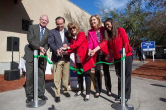 Jacksonville Mayor Lenny Curry and members of the Jacksonville City Council participate in the ribbon cutting ceremony for the Grand Opening of the Urban Rest Stop, a joint venture of Sulzbacher Center and the Mental Health Resource Center.