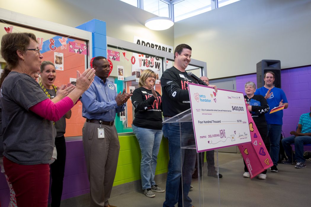 Petco Foundation representatives present a check for $400,000 to ACPS staff during their surprise Valentine's Day visit to the animal shelter.