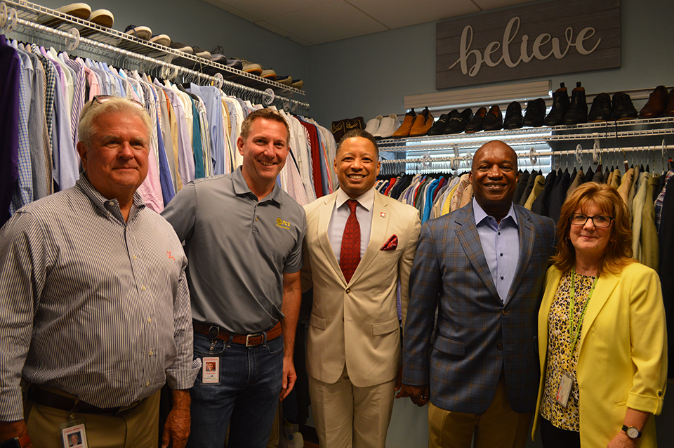 Scott Cairns, Chris Austin, Kevin Holzendorf, Nathaniel Ford and Cindy Funkhauser at opening of new Sulzbacher Men's Career Closet